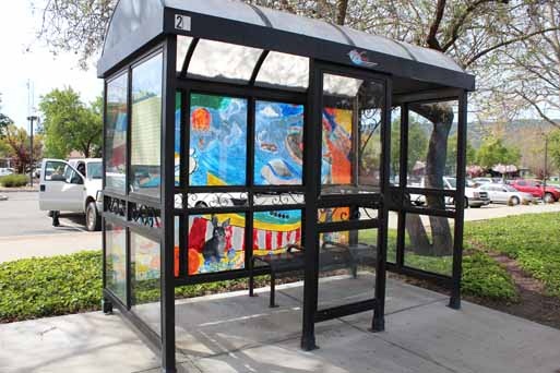 Decorated bus stop enclosure