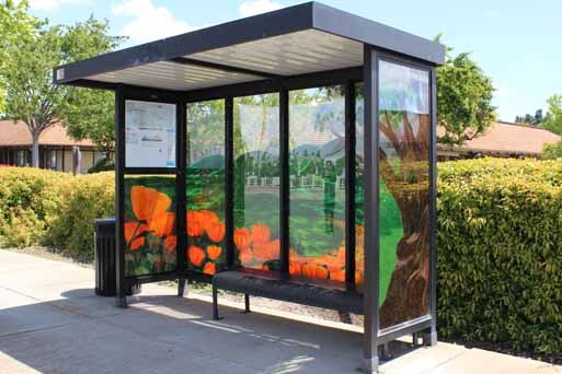 Decorated bus stop enclosure